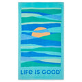 Hazy Sunrise Beach Towel